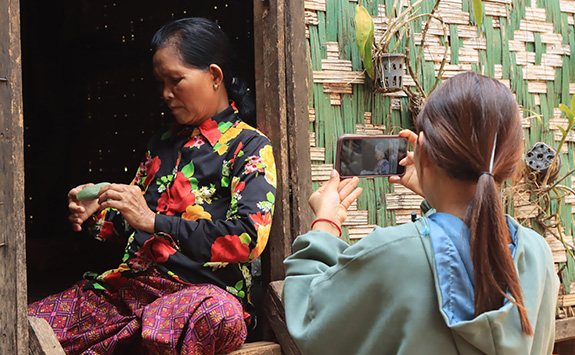 Participants filming on a smartphone